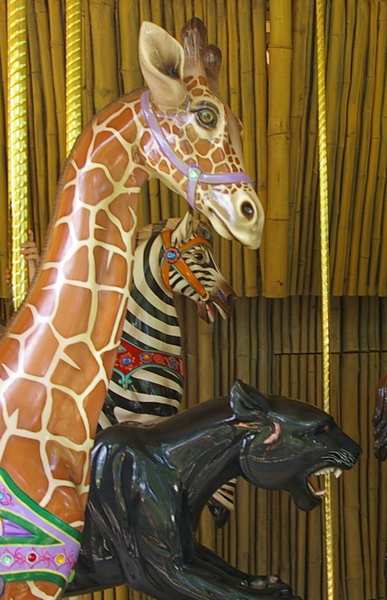 Carousel giraffe, panther, zebra