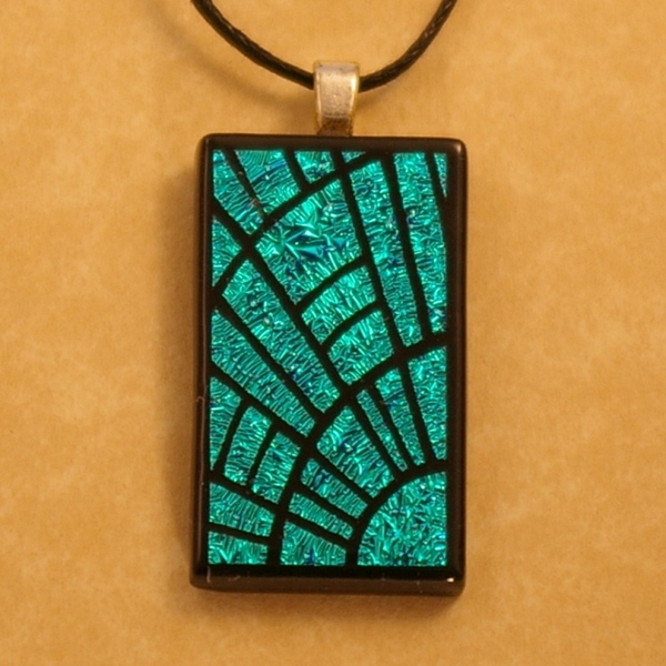 Laser etched pendant