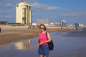 Kay on beach collecting shells